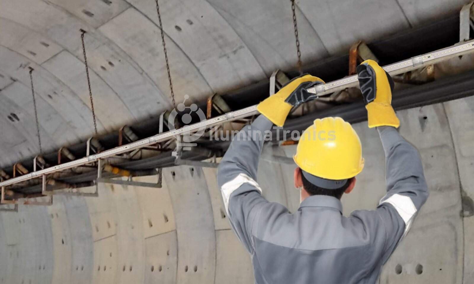 LED strip installation on cable tray in subway tunnel