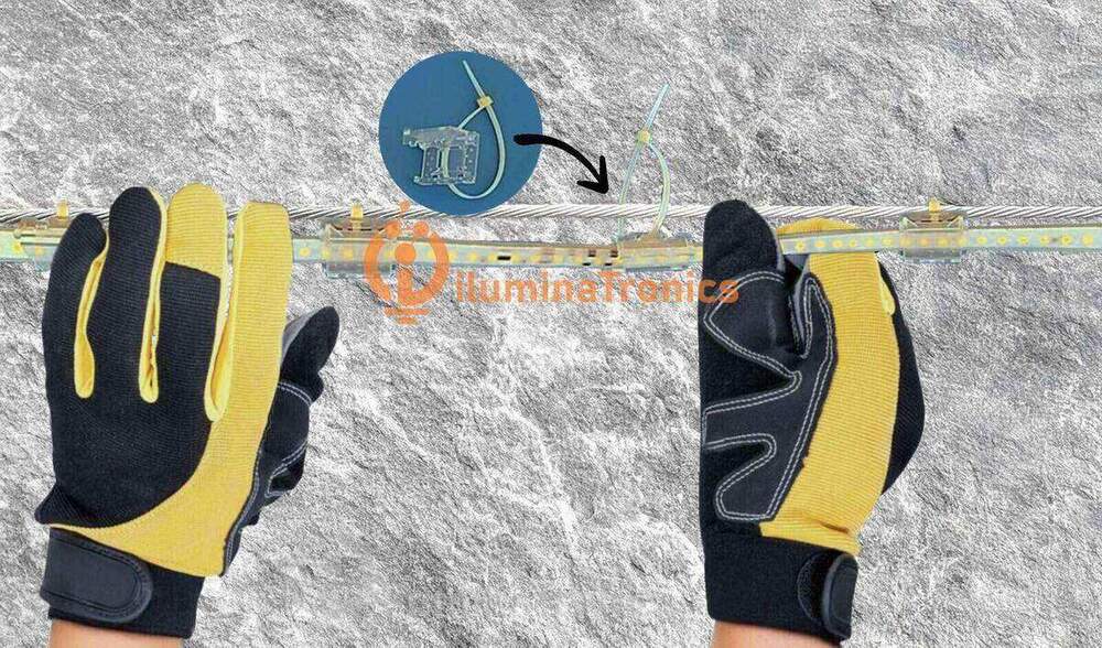 LED strip installation on cable tray in mining tunnel