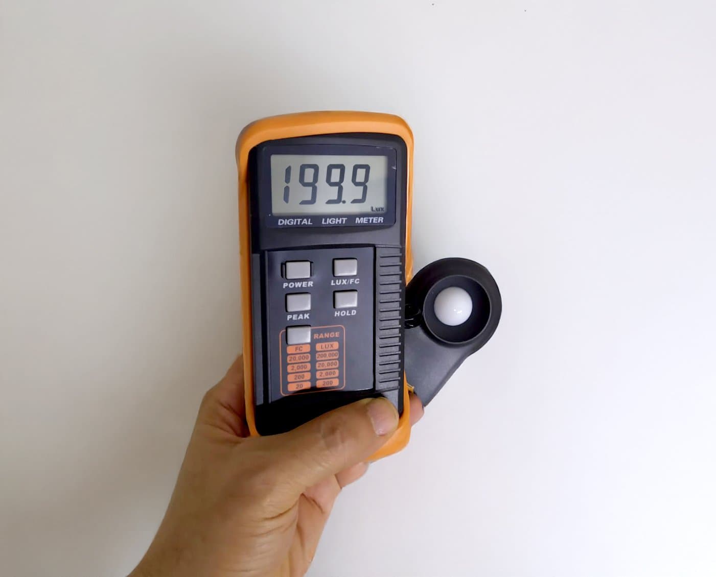 Luxmeter reading 199 lux from LED strip in subway tunnel