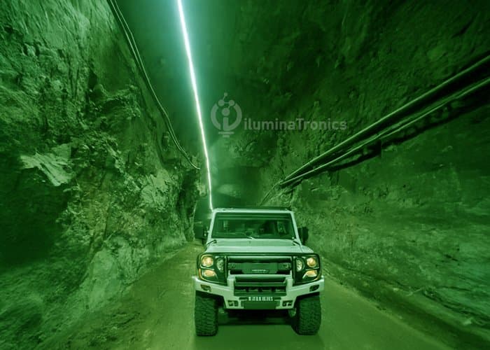 Underground mining tunnel illuminated with green LED strip lighting