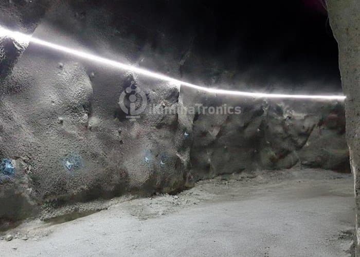 Underground mining tunnel illuminated with white LED strip lighting